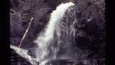 Holland Lake Montana USA (1972): A View Of The Waterfalls Surrounded By The Rocky