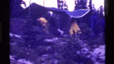 Holland Lake Montana USA (1972): People Gathering Tents Village Mountains Dark