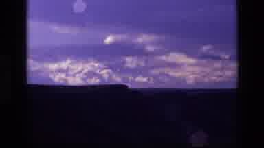 Idaho USA (1972): Beautiful And Claiming Clouds Rolling Across A Purple Sky To Set
