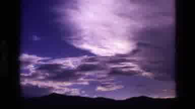 Idaho USA (1972): Cloudy Sky The Right Side Is Dark The Sun Is Behind The Clouds