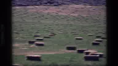 Idaho USA (1972): Hay Bales Sitting In Green Fields On A Bright Sunny Day