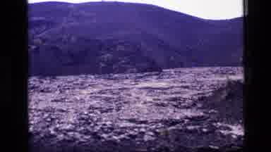 Idaho USA (1972): The Camera Pans Across The Hillside And Shows Trees And Grass