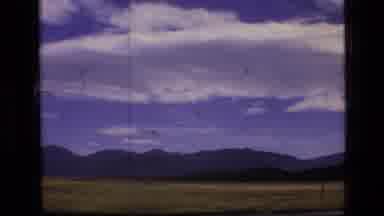 SCAPEGOAT WILDERNESS MONTANA USA .MP-1973: Meadow With Hills And Clouds With