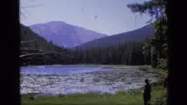 SCAPEGOAT WILDERNESS MONTANA USA .MP-1973: A Man Standing Next To A Small River