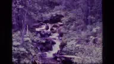 SCAPEGOAT WILDERNESS MONTANA USA .MP-1973: A Stream Flowing Through Rocks In A