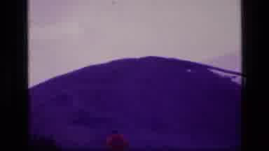 SCAPEGOAT WILDERNESS MONTANA USA .MP-1973: Two Men Walking Towards A Snow Peaked