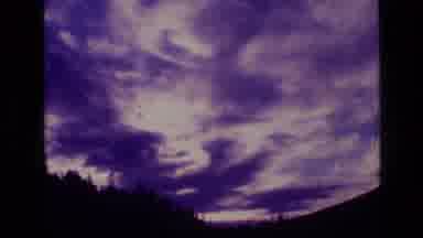 SCAPEGOAT WILDERNESS MONTANA USA .MP-1973: Sunset In The Forest Shading The Lake