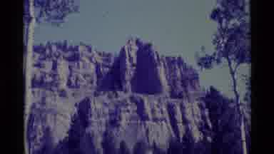 Agate Springs Montana USA (1975): A Mountain Overlooking A Forest And Purple