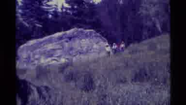Agate Springs Montana USA (1975): Backpackers Hike Through A Grassy Trail Lined By