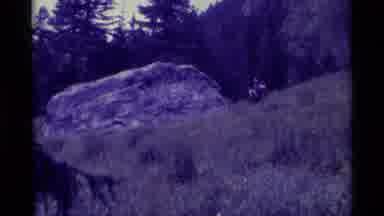 AGATE SPRINGS MONTANA USA-1975: Two People Horseback Riding Through Meadow