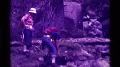 Agate Springs Montana USA (1975): Scientists Navigating A Mountain Stream To Look