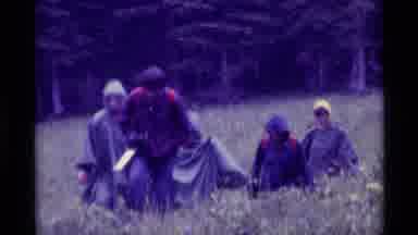 Agate Springs Montana USA (1975): Five People In Rain Gear Hiking Through
