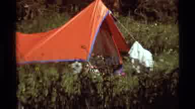 Agate Springs Montana USA (1975): People In Red And Yellow Tent In An Opening