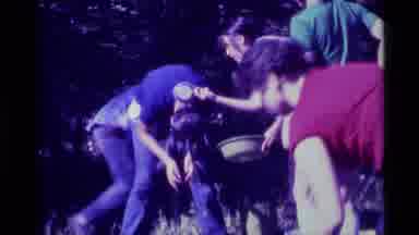 Agate Springs Montana USA (1975): Young Adults Pouring Water On A Young Man B The