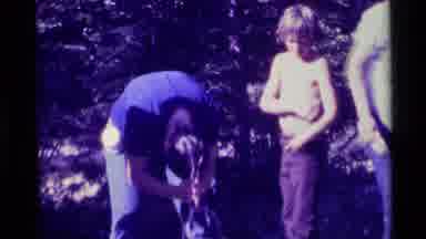 Agate Springs Montana USA (1975): Person Wringing Water From Hair In A Bright