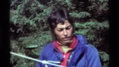 Agate Springs Montana USA (1975): Man With Blue Coat Is Working With Another Man