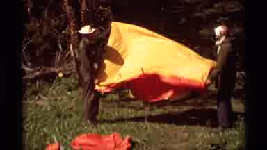 Agate Springs Montana USA (1975): Two Men Out Camping Working Together To Fix