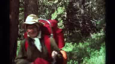 Agate Springs Montana USA (1975): Old Woman Hiking Through Woods Before Sitting