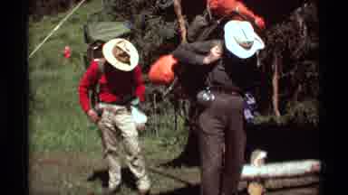 Agate Springs Montana USA (1975): Travelers Packing Up Their Heavy Hiking Backpack
