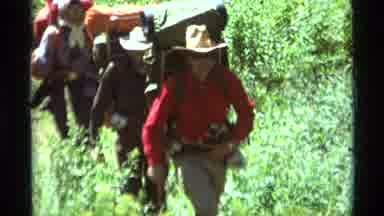 Agate Springs Montana USA (1975): Travelers Trekking Through Woods With Backpacks