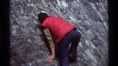 Agate Springs Montana USA (1975): Person Attempting To Climb The Side Of A Rock Or