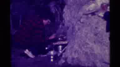Agate Springs Montana USA (1975): Snowy Mountain; Person Prepares Food On Stove