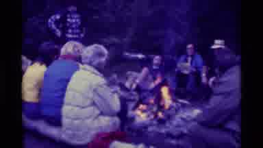 Agate Springs Montana USA (1975): Large Group Sat Surrounding A Roaring Log