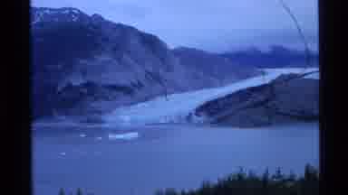 Alaska USA (1977): Frozen Water Stream Leading To A Larger Body Of Water In The