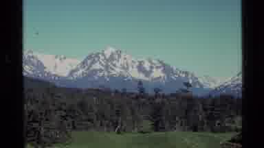 Alaska USA (1977): Alaskan Wilderness With Shot Of Mountains And Person Pointing