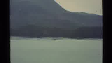 Alaska USA (1977): Panning Across A Lake And Zooming In On An Object On The