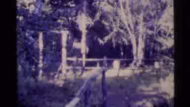 Alaska USA (1977): People Viewing A Grave Site In A Woods Of A Person With The