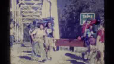 Alaska USA (1977): Hikers Walking By A Bridge With The Sign Saying TaÃ­ya River