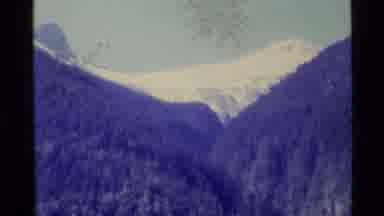 Alaska USA (1977): Old Mountain Side Scenery Clip Zooming Out For Dramatic Effect