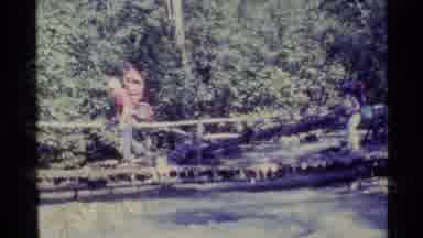 Alaska USA (1977): Two Hikers Pass Through A Bridge At The Chinook Trail At The