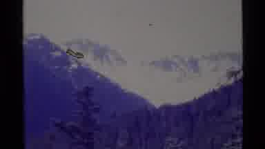 Alaska USA (1977): Icy Mountain Close Up And Water Flowing Down A Woody Creek