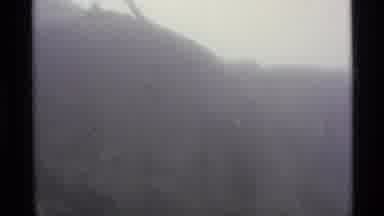 Alaska USA (1977): Hikers Going Through Rough Terrain While Its Raining Headed To