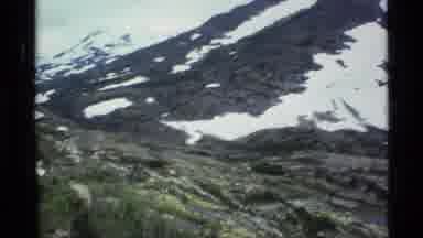 ALASKA USA-1977: Blooming Alpine Flowers and Snow-Dusted Mountain Landscape