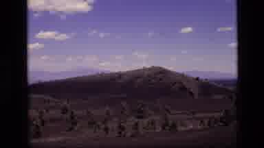 Idaho USA (1972): Large Vast Scenic Shot Of Mountain With Surrounding Trees And