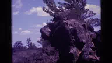 Idaho USA-1972: Natural Rock Formations Surrounded By Trees And Brush
