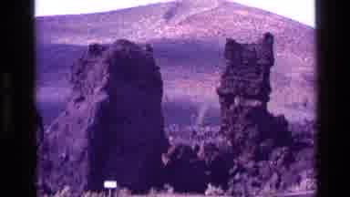 Idaho USA (1972): A View Of Big Rocks Surrounded By Very High Mountain Peaks
