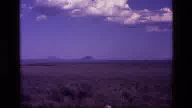 Idaho USA (1972): Desert Nature With A Mountain In The Background Zooming In On
