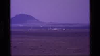 Idaho USA (1972): Field Of Dried Grass With Mountain In Back Cut To Partially