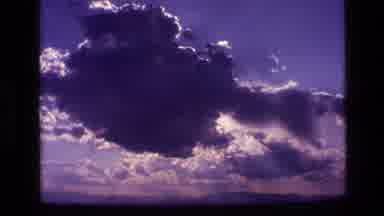 Idaho USA (1972): Camera Pans Across The Sky Full Of Huge White Fluffy Clouds As