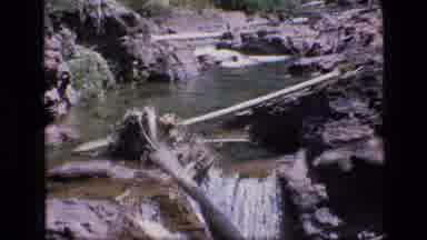 SCAPEGOAT WILDERNESS MONTANA USA .MP-1973: Beautiful Waterfall Flowing Over Huge