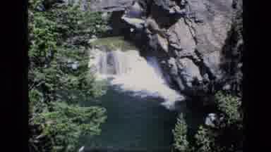 SCAPEGOAT WILDERNESS MONTANA USA .MP-1973: Waterfall Into Crystal Blue River On