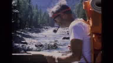 SCAPEGOAT WILDERNESS MONTANA USA .MP-1973: Man With A Pipe Looking At A Map And