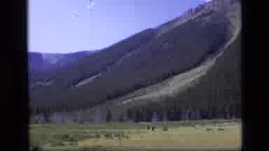 SCAPEGOAT WILDERNESS MONTANA USA .MP-1973: People Walking Through Valley In