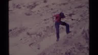 MINARET WILDERNESS CALIFORNIA USA .M-1975: Man In Red Shirt Repelling Down Cliff