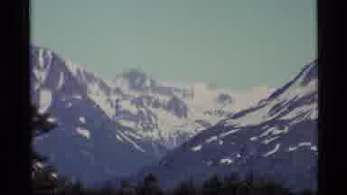 Alaska USA (1977): Lush Green Valley Beneath A Resplendent Mountain Range Covered