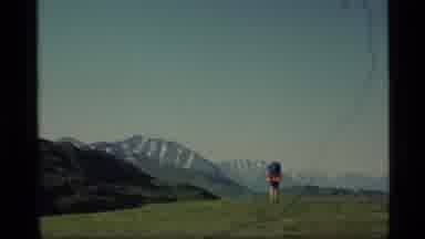 Alaska USA (1977): A Man Hiking Near Big Mountain Peaks